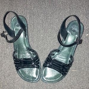 Black leather sandals with 2 1/2 inch heel.